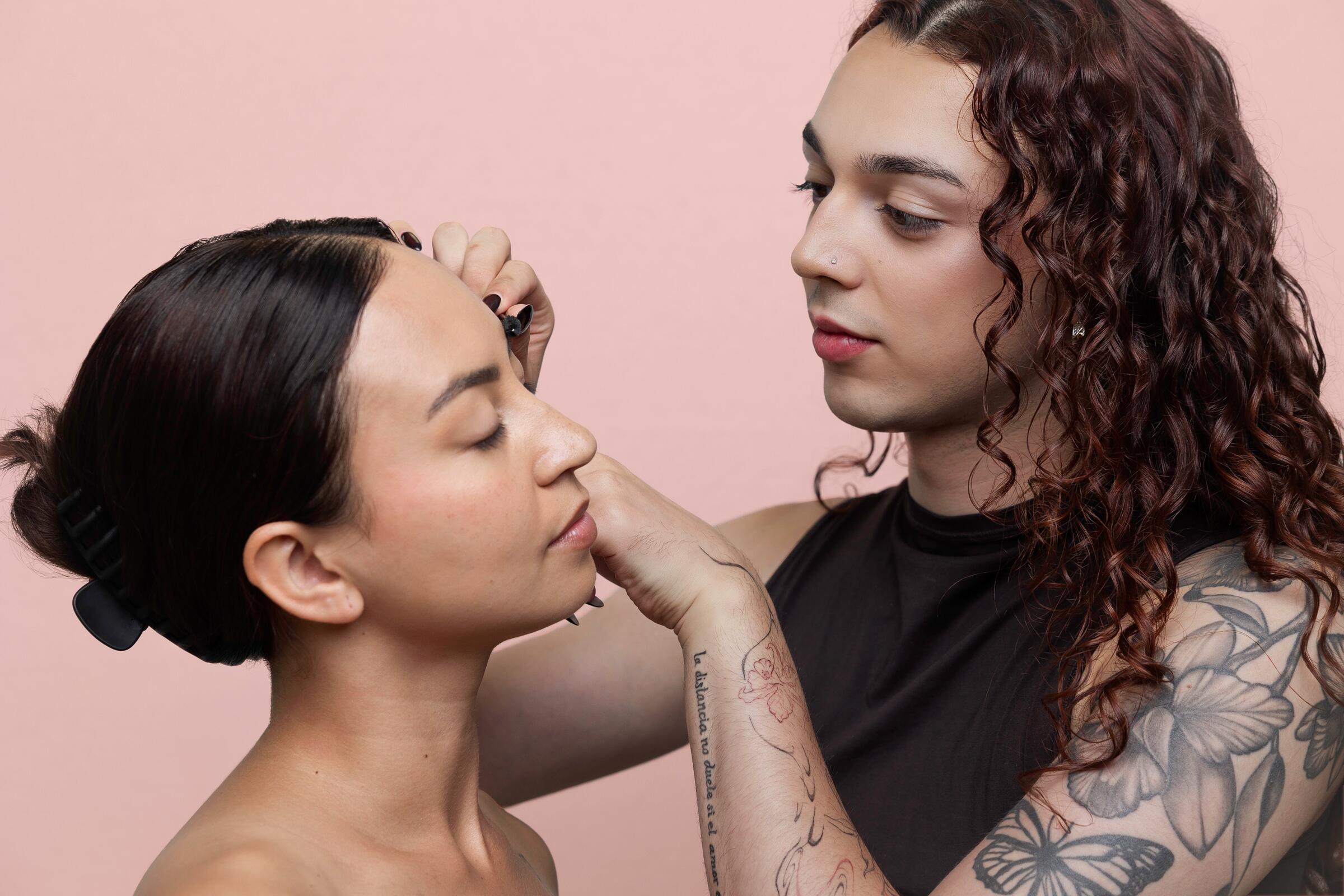 Sereka working on a client’s brows